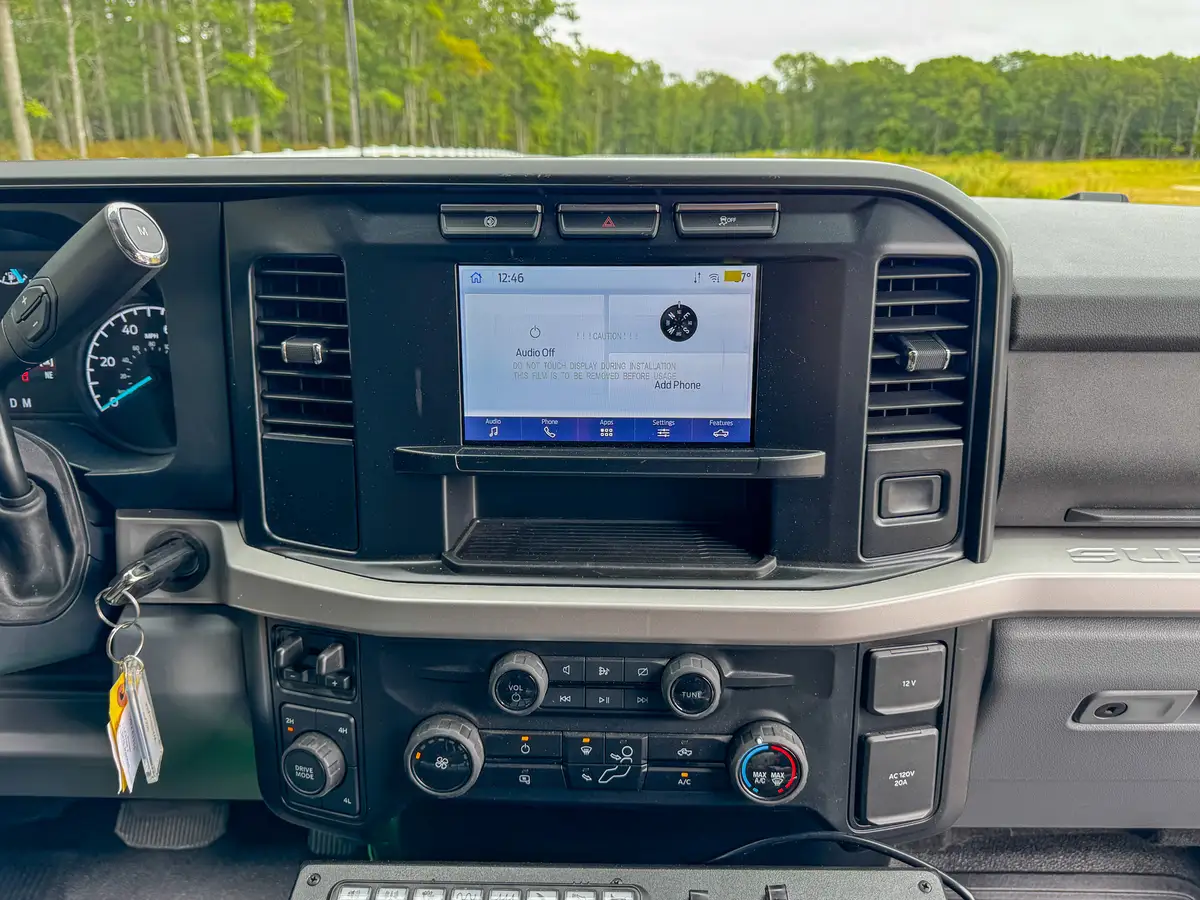 Rear-to-front cabin view showing back seats, center console, and front seats.